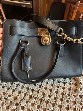 Michael Kors Black Satchel with Gold Hardware